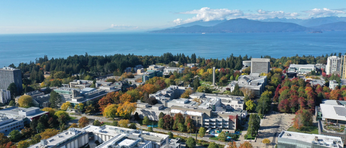 an aerial shot of ubc with the Pacific Ocean in the background